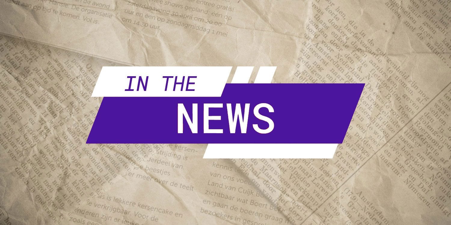 Graphic with "IN THE NEWS" over newspaper.
